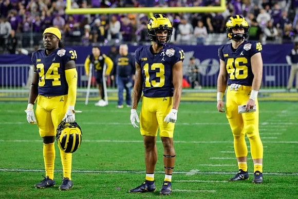 Leon Franklin (34), Tyler Morris (13), Alexander Lidback (46), and Blake Corum (2)