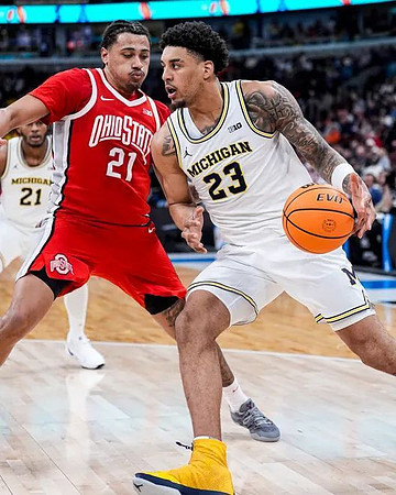 Morez Johnson Jr. (21) and Yaxel Lendeborg (23)