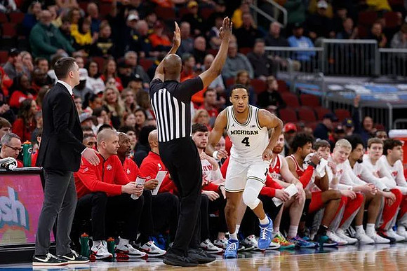 Ohio State Head Coach Jake Diebler and Nimari Burnett (4)