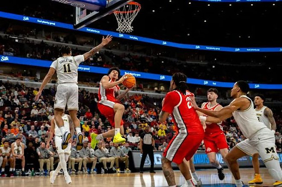 Roddy Gayle Jr. (11), Nimari Burnett (4), and Yaxel Lendeborg (23)