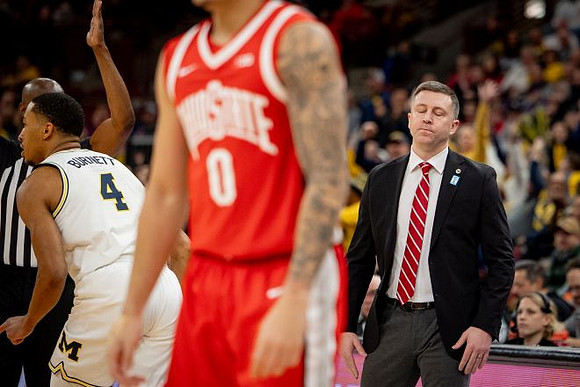 Nimari Burnett (4) and Ohio State Head Coach Jake Diebler