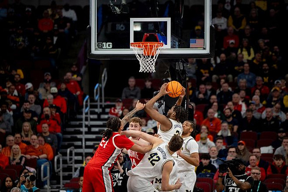 Roddy Gayle Jr. (11), Will Tschetter (42), and Morez Johnson Jr. (21)