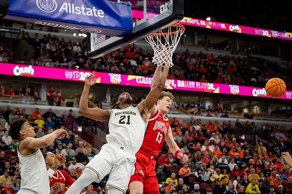 Yaxel Lendeborg (23) and Morez Johnson Jr. (21)
