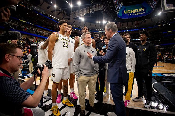 Dusty May and Michigan Team
