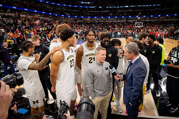 Dusty May and Michigan Team
