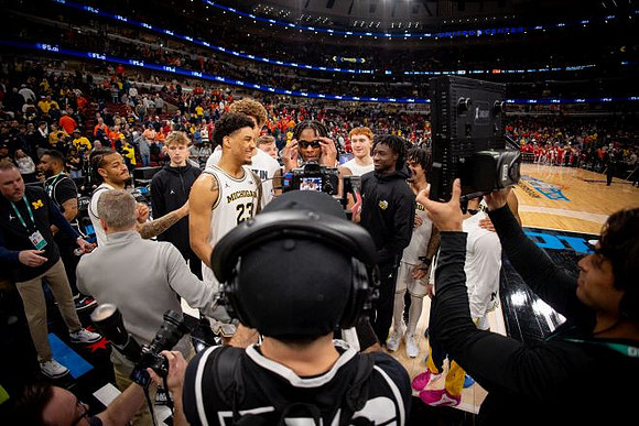 Dusty May and Michigan Team