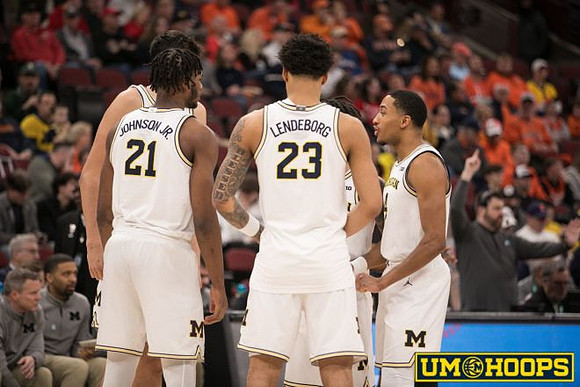 Morez Johnson Jr. (21), Aday Mara (15), Yaxel Lendeborg (23), Trey McKenney (1), and Elliot Cadeau (3)
