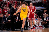 Wisconsin Head Coach Greg Gard and Will Tschetter (42)