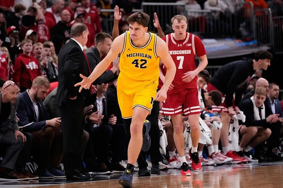 Wisconsin Head Coach Greg Gard and Will Tschetter (42)
