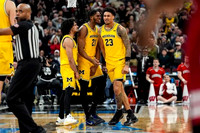 Elliot Cadeau (3), Morez Johnson Jr. (21), and Yaxel Lendeborg (23)