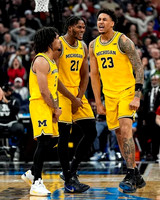 Elliot Cadeau (3), Morez Johnson Jr. (21), and Yaxel Lendeborg (23)