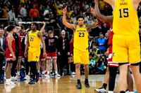 Morez Johnson Jr. (21), Yaxel Lendeborg (23), and Aday Mara (15)
