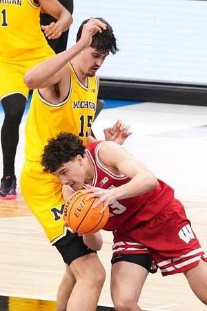 Trey McKenney (1) and Aday Mara (15)