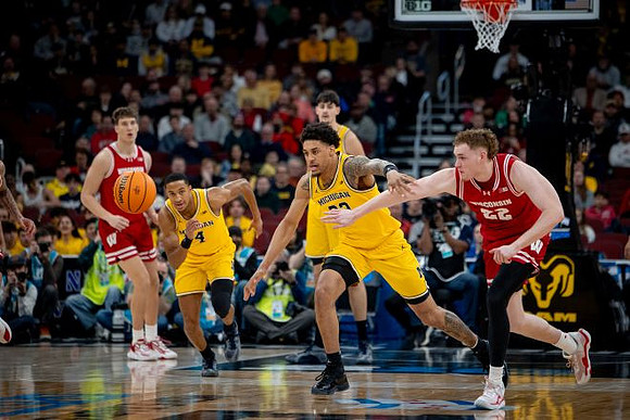 Nimari Burnett (4), Yaxel Lendeborg (23), and Aday Mara (15)