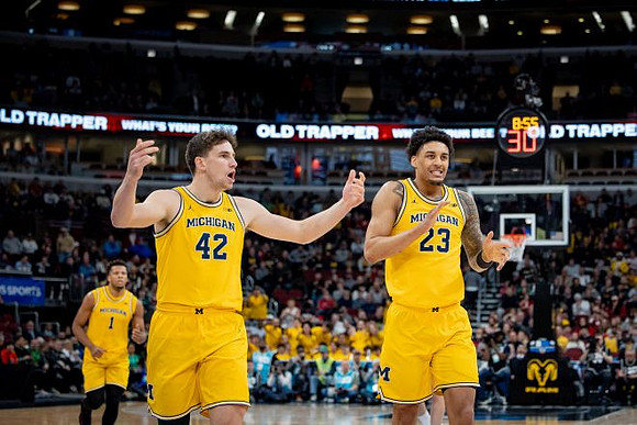 Trey McKenney (1), Will Tschetter (42), and Yaxel Lendeborg (23)