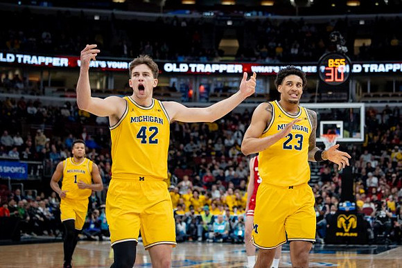 Trey McKenney (1), Will Tschetter (42), and Yaxel Lendeborg (23)