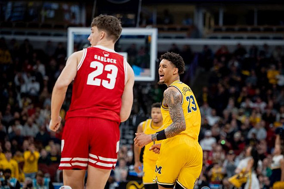 Yaxel Lendeborg (23) and Trey McKenney (1)