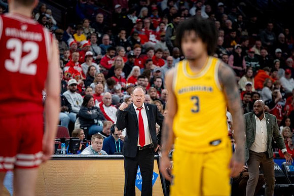 Wisconsin Head Coach Greg Gard and Elliot Cadeau (3)