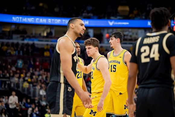 Morez Johnson Jr. (21), Will Tschetter (42), and Aday Mara (15)
