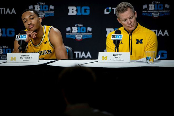 Nimari Burnett (4) and Dusty May
