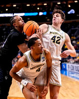 Nimari Burnett (4) and Will Tschetter (42)