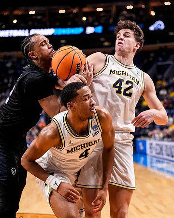 Nimari Burnett (4) and Will Tschetter (42)