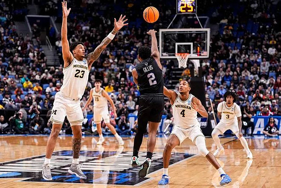 Yaxel Lendeborg (23), Aday Mara (15), Nimari Burnett (4), and Elliot Cadeau (3)