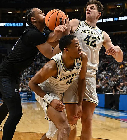 Nimari Burnett (4) and Will Tschetter (42)