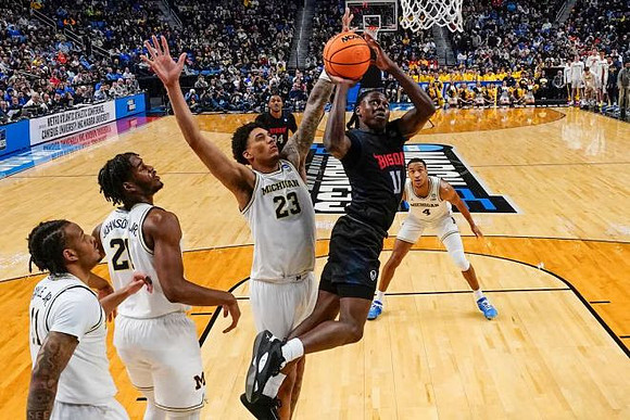 Roddy Gayle Jr. (11), Morez Johnson Jr. (21), Yaxel Lendeborg (23), and Nimari Burnett (4)