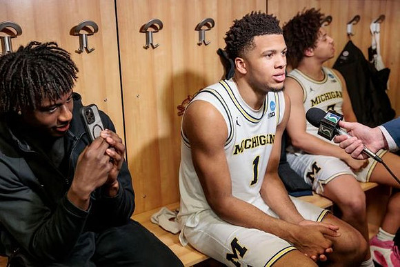 Trey McKenney (1) and Howard Eisley Jr. (7)