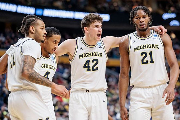 Roddy Gayle Jr. (11), Nimari Burnett (4), Will Tschetter (42), and Morez Johnson Jr. (21)