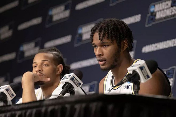 Roddy Gayle Jr. (11) and Morez Johnson Jr. (21)