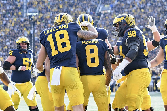 Greg Crippen (51), Colston Loveland (18), Tyler Morris (8), and Giovanni El-Hadi (58)