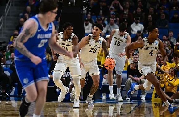 Morez Johnson Jr. (21), Yaxel Lendeborg (23), Aday Mara (15), and Nimari Burnett (4)