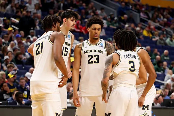 Morez Johnson Jr. (21), Aday Mara (15), Yaxel Lendeborg (23), and Elliot Cadeau (3)