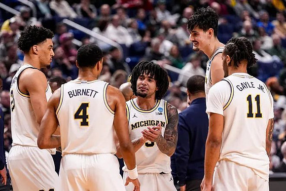 Yaxel Lendeborg (23), Nimari Burnett (4), Elliot Cadeau (3), Aday Mara (15), and Roddy Gayle Jr. (11)