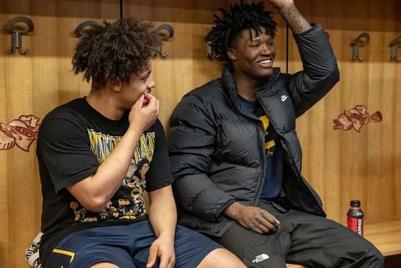Howard Eisley Jr. (7) and L.J. Cason (2)
