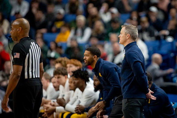 Dusty May and Michigan Team