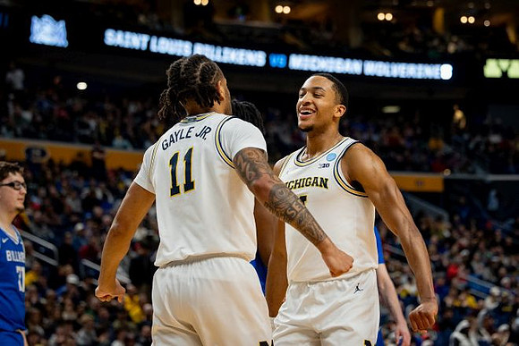 Roddy Gayle Jr. (11) and Nimari Burnett (4)