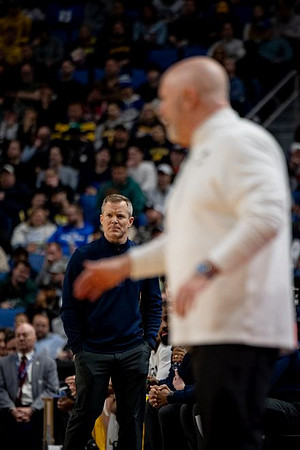 Dusty May and Saint Louis Head Coach Josh Schertz