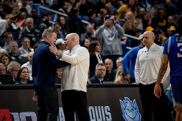 Dusty May and Saint Louis Head Coach Josh Schertz