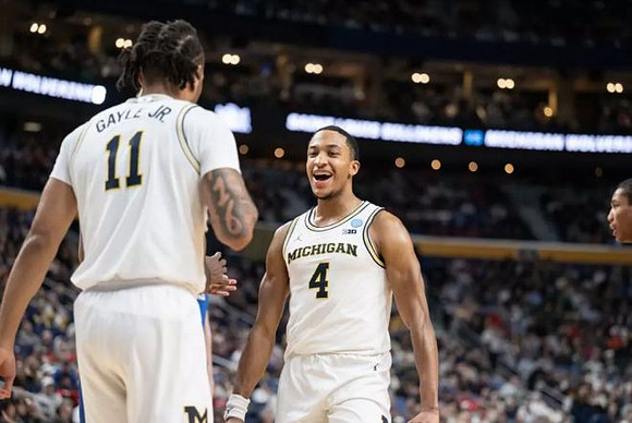 Roddy Gayle Jr. (11) and Nimari Burnett (4)
