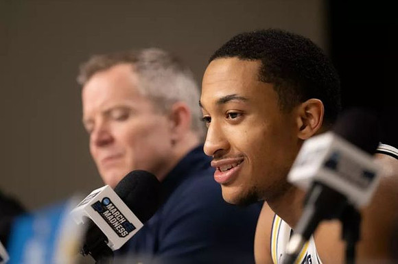 Nimari Burnett (4) and Dusty May