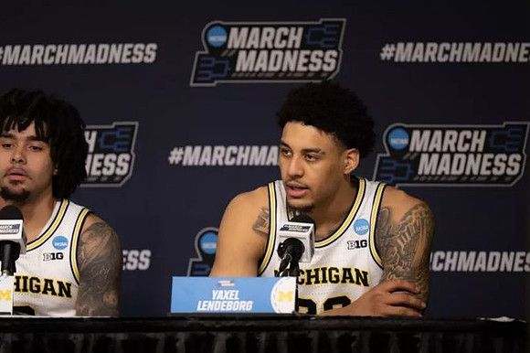 Elliot Cadeau (3) and Yaxel Lendeborg (23)