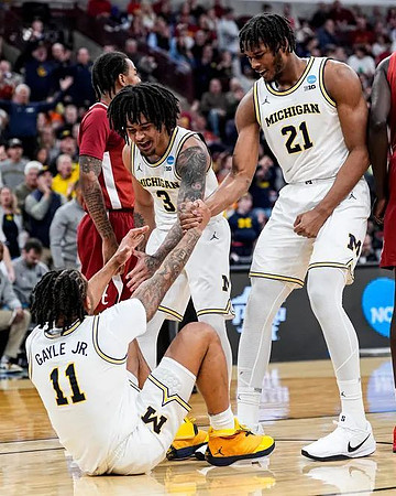 Roddy Gayle Jr. (11), Elliot Cadeau (3), and Morez Johnson Jr. (21)