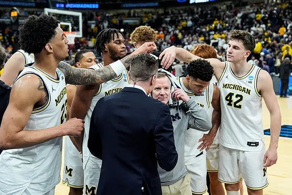 Dusty May and Michigan Team