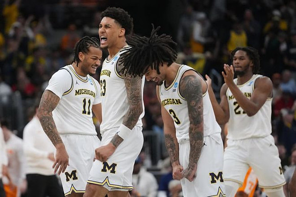 Roddy Gayle Jr. (11), Yaxel Lendeborg (23), Elliot Cadeau (3), and Morez Johnson Jr. (21)