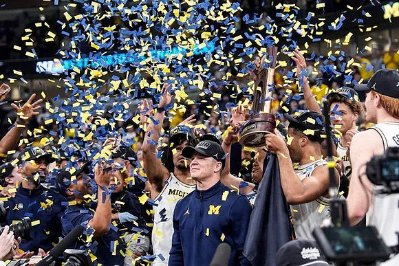 Dusty May, Michigan Team, and Midwest Regional Championship Trophy