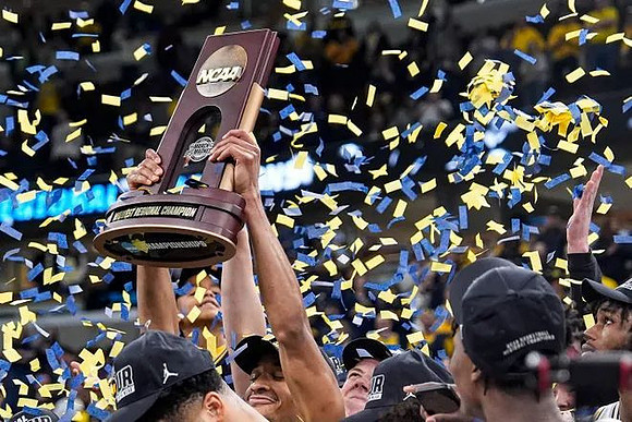 Dusty May, Michigan Team, and Midwest Regional Championship Trophy