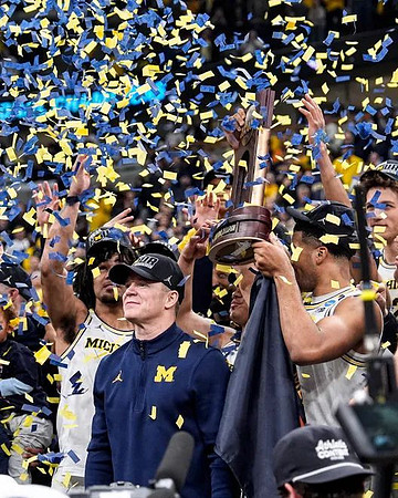 Dusty May, Michigan Team, and Midwest Regional Championship Trophy
